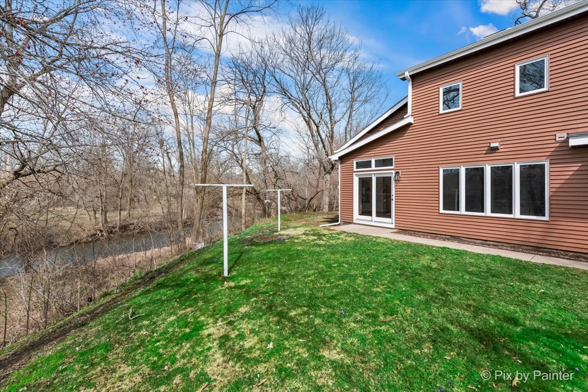 7611 Beverly Way Spring Grove, IL 60081 - Photo 32 of 33 a view of a house with backyard