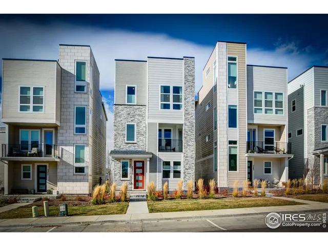 a front view of a building with street view