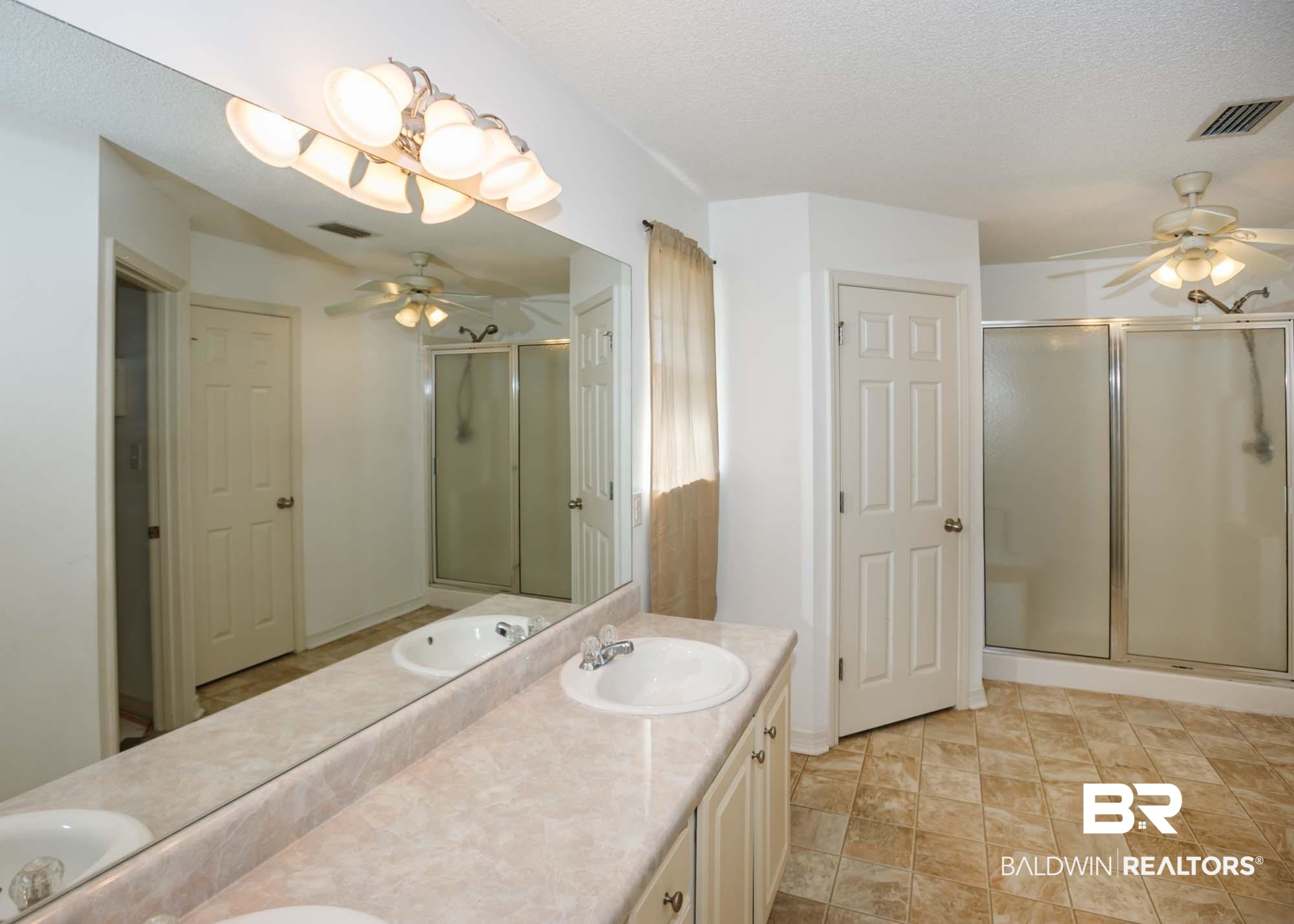 2530 Ashburn Lane Foley, AL 36535 - Photo 23 of 46 Bathroom with a textured ceiling, vanity, and walk in shower