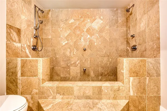 a bathroom with a shower curtain