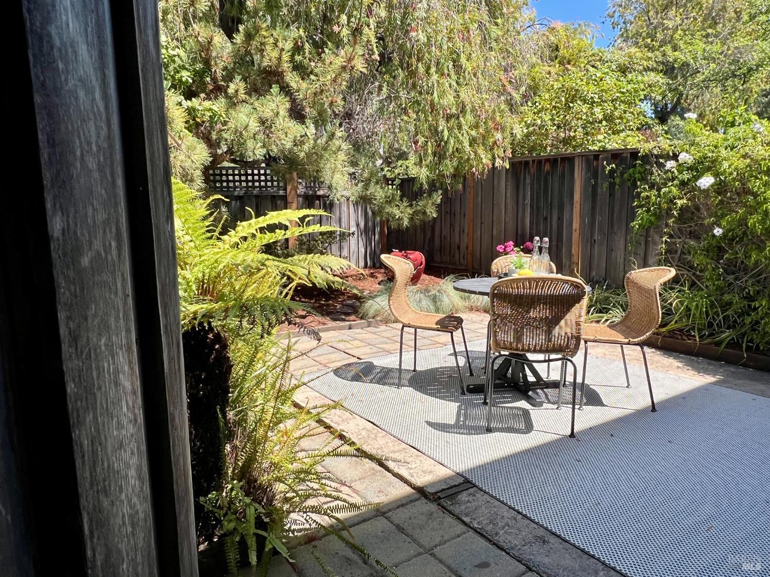 29 Porto Bello Drive San Rafael, CA 94901 - Photo 2 of 41 Little haven for dining, pets, or tinkering in the garden.