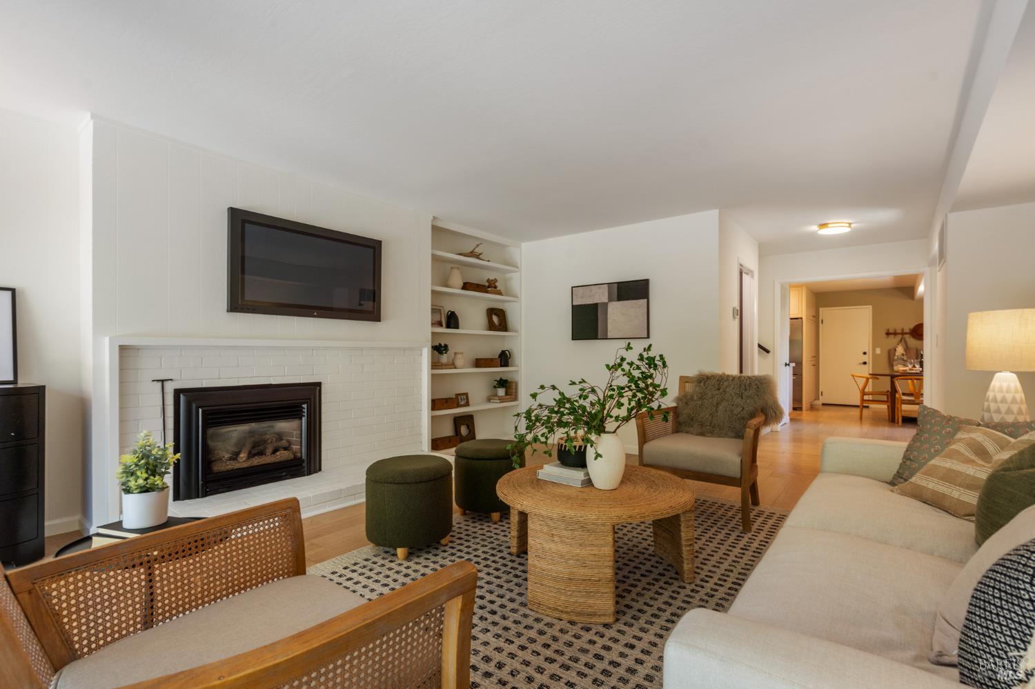 29 Porto Bello Drive San Rafael, CA 94901 - Photo 25 of 41 Fireplace, built-in book shelves, and lots of room for relaxing.