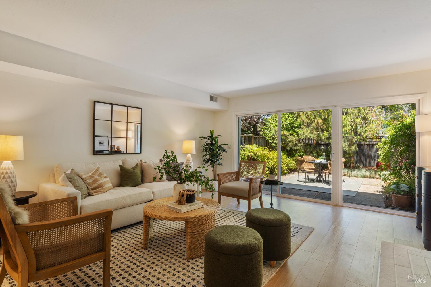 29 Porto Bello Drive San Rafael, CA 94901 - Photo 3 of 41 A spacious living room opens right out to the patio garden.