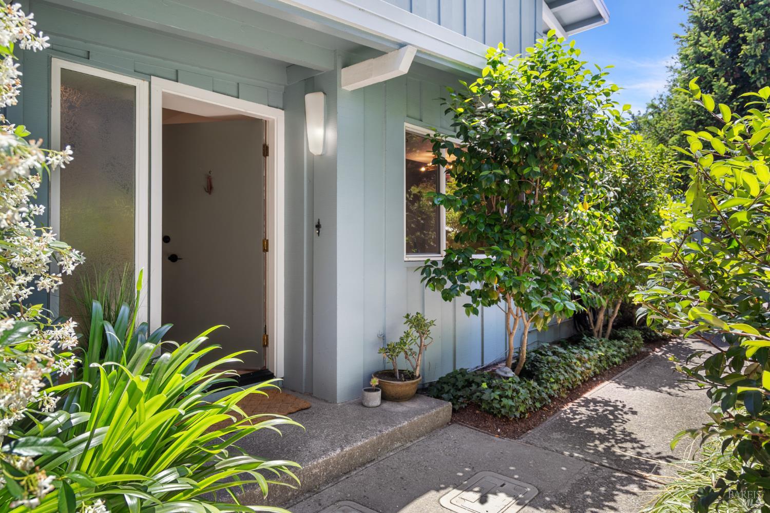 29 Porto Bello Drive San Rafael, CA 94901 - Photo 6 of 41 With a private walkway entrance, this end unit offers privacy.