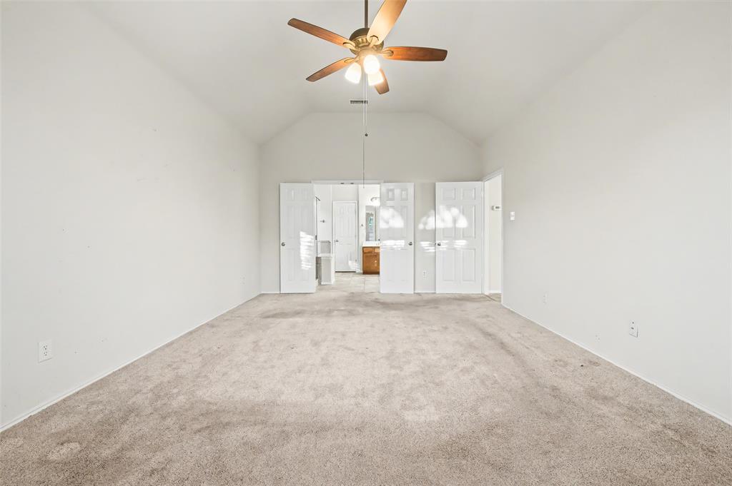 4902 Spring Lake Parkway Mansfield, TX 76063 - Photo 18 of 38 a view of a livingroom with a ceiling fan and window
