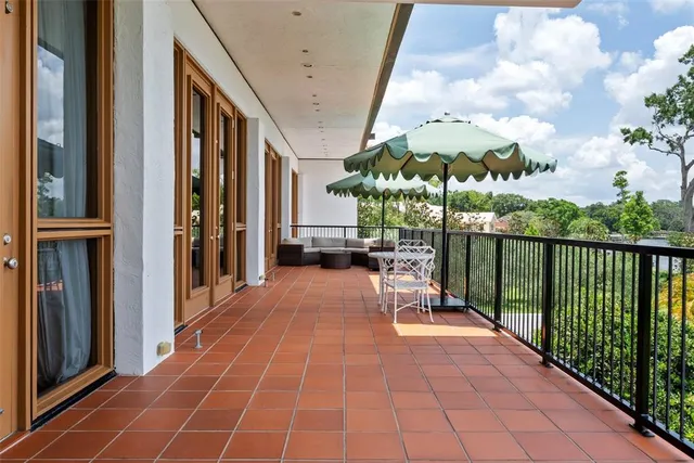 a kitchen with a sink and a stove top oven