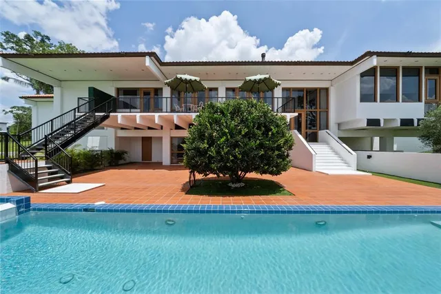 a front view of a house with yard