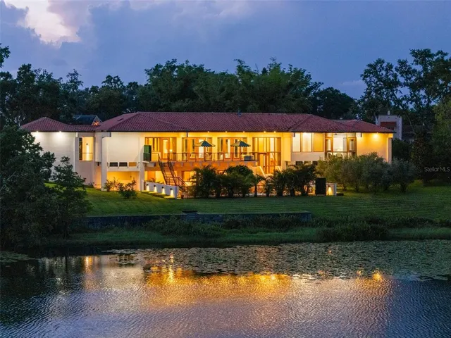 a view of swimming pool and lake