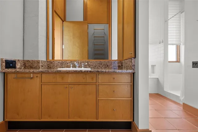 a swimming pool with some trees in the background