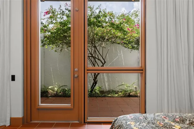 a view of a swimming pool with an outdoor seating and a pathway