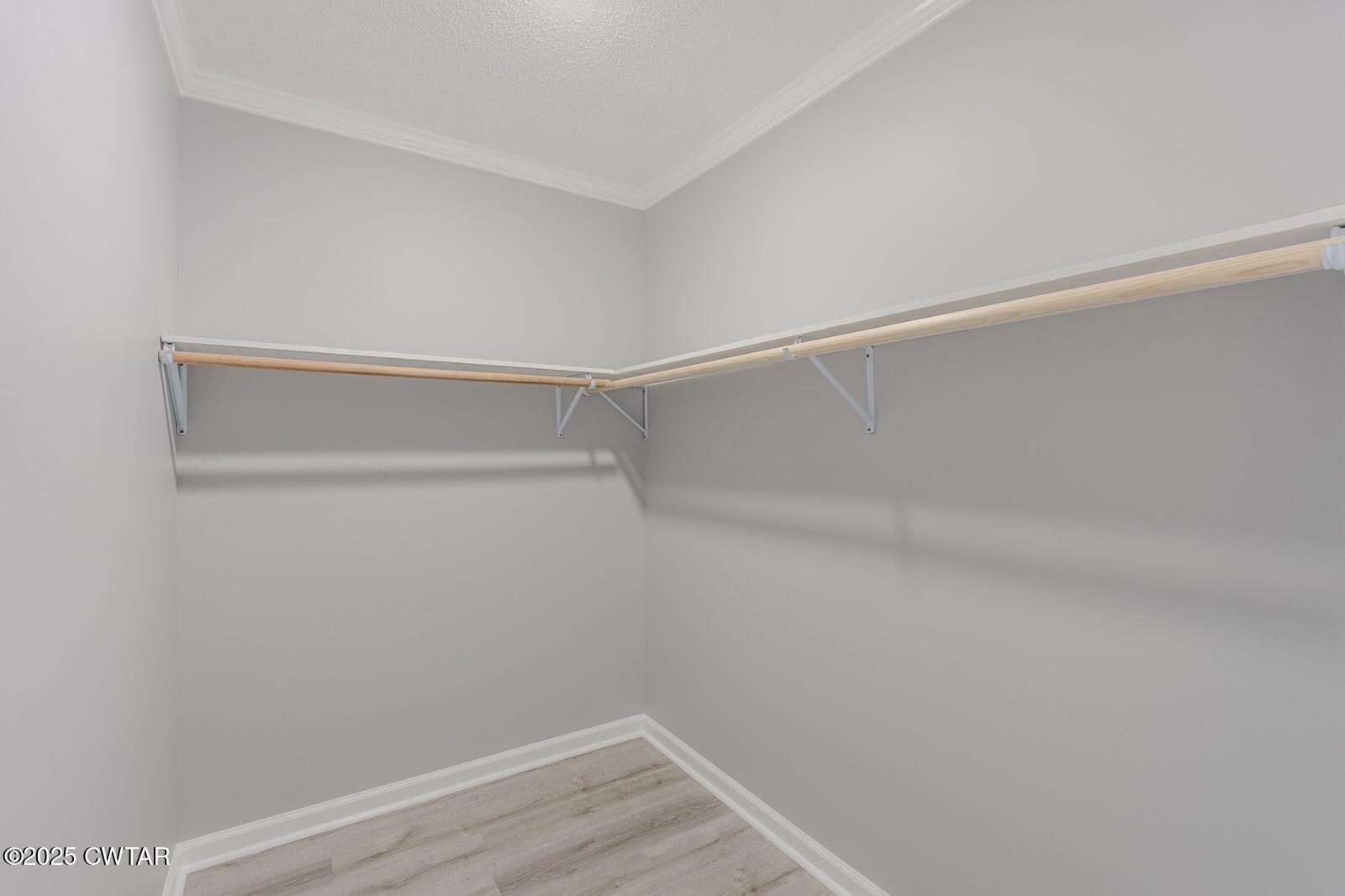 77 Upper Zion Road Brownsville, TN 38012 - Photo 12 of 27 a view of an empty walk in closet