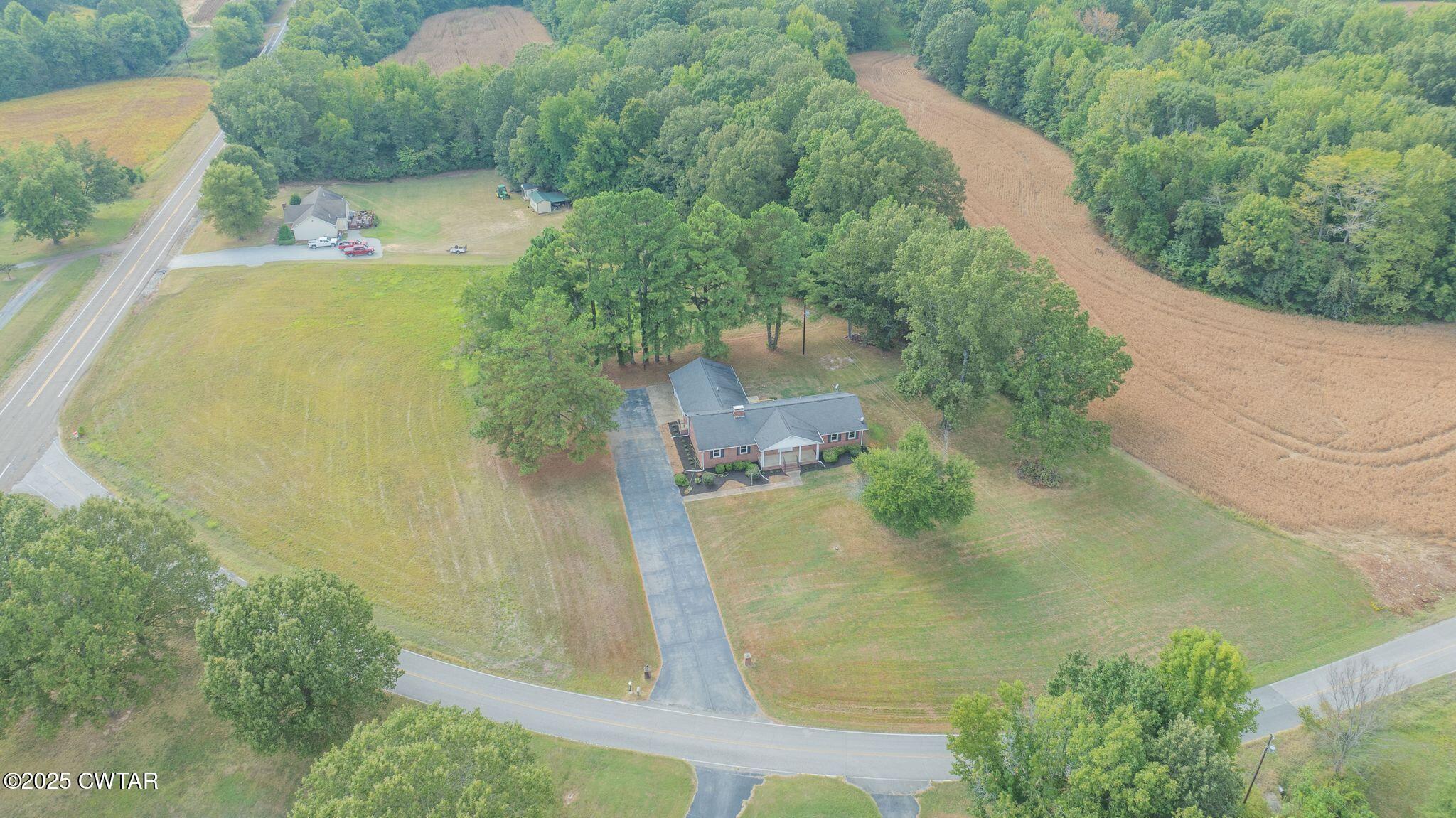 77 Upper Zion Road Brownsville, TN 38012 - Photo 27 of 27 an aerial view of residential houses with outdoor space