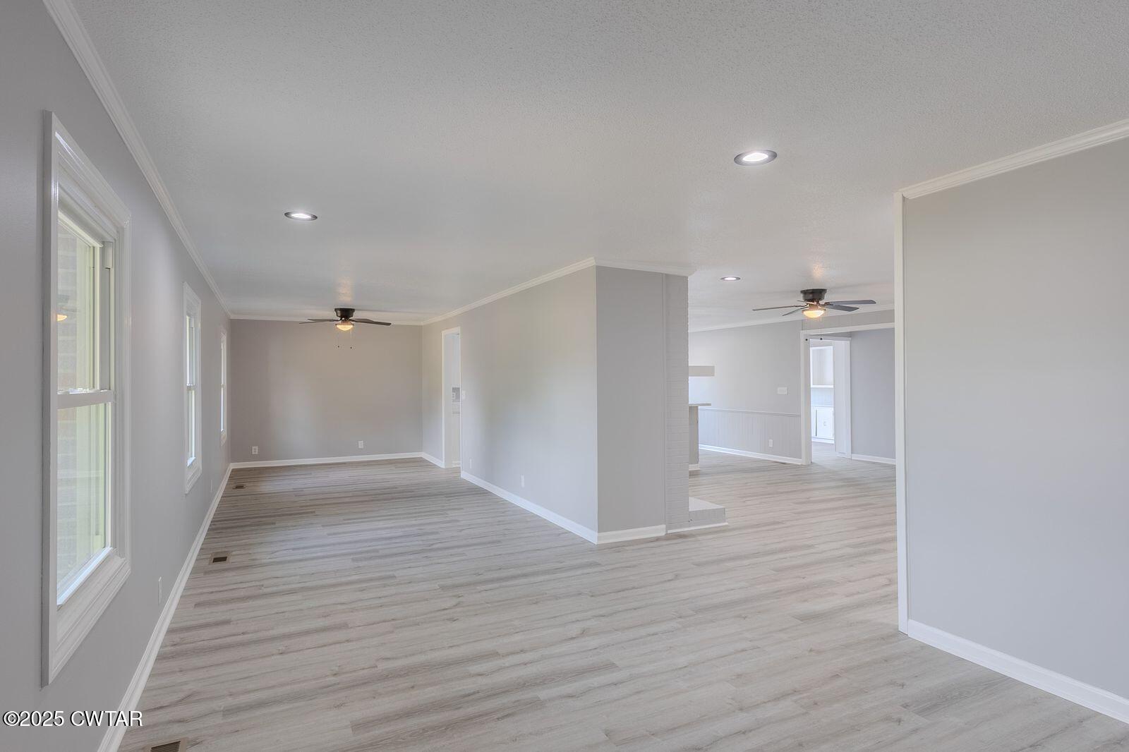 77 Upper Zion Road Brownsville, TN 38012 - Photo 4 of 27 a view of empty room with wooden floor