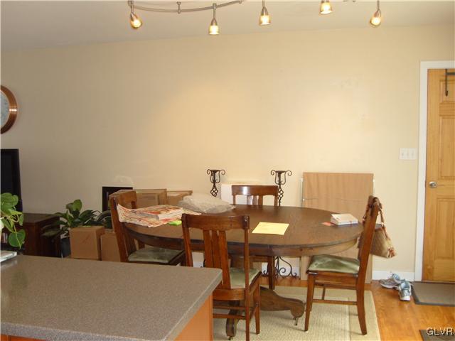 2276 Jordan Road Orefield, PA 18069 - Photo 5 of 17 a view of a dining room with furniture and wooden floor