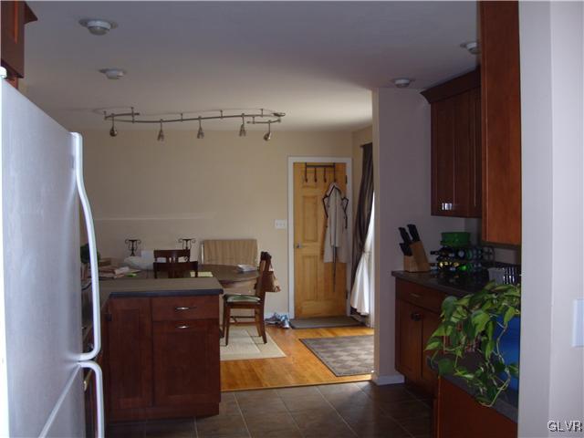 2276 Jordan Road Orefield, PA 18069 - Photo 8 of 17 a room with cabinets and flower pot