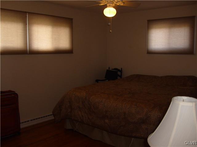 2276 Jordan Road Orefield, PA 18069 - Photo 10 of 17 a bed sitting in a room next to a window