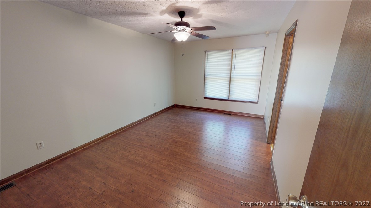 508 Jennings Farm Road Fayetteville, NC 28314 - Photo 13 of 24 a view of an empty room with a window