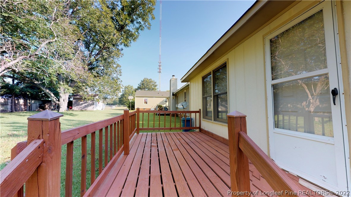 508 Jennings Farm Road Fayetteville, NC 28314 - Photo 19 of 24 a view of balcony with wooden floor and fence