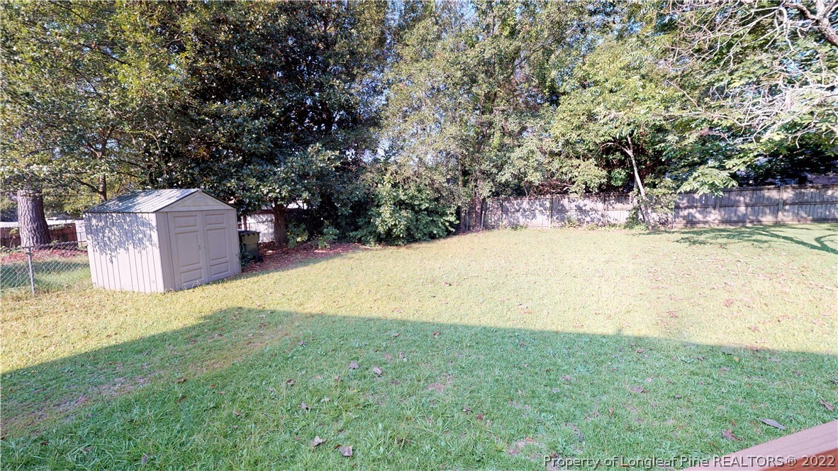 508 Jennings Farm Road Fayetteville, NC 28314 - Photo 20 of 24 a view of a yard with a tree
