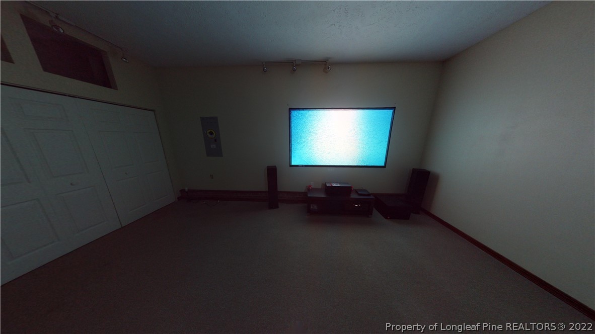 508 Jennings Farm Road Fayetteville, NC 28314 - Photo 4 of 24 a living room with furniture and a flat screen tv
