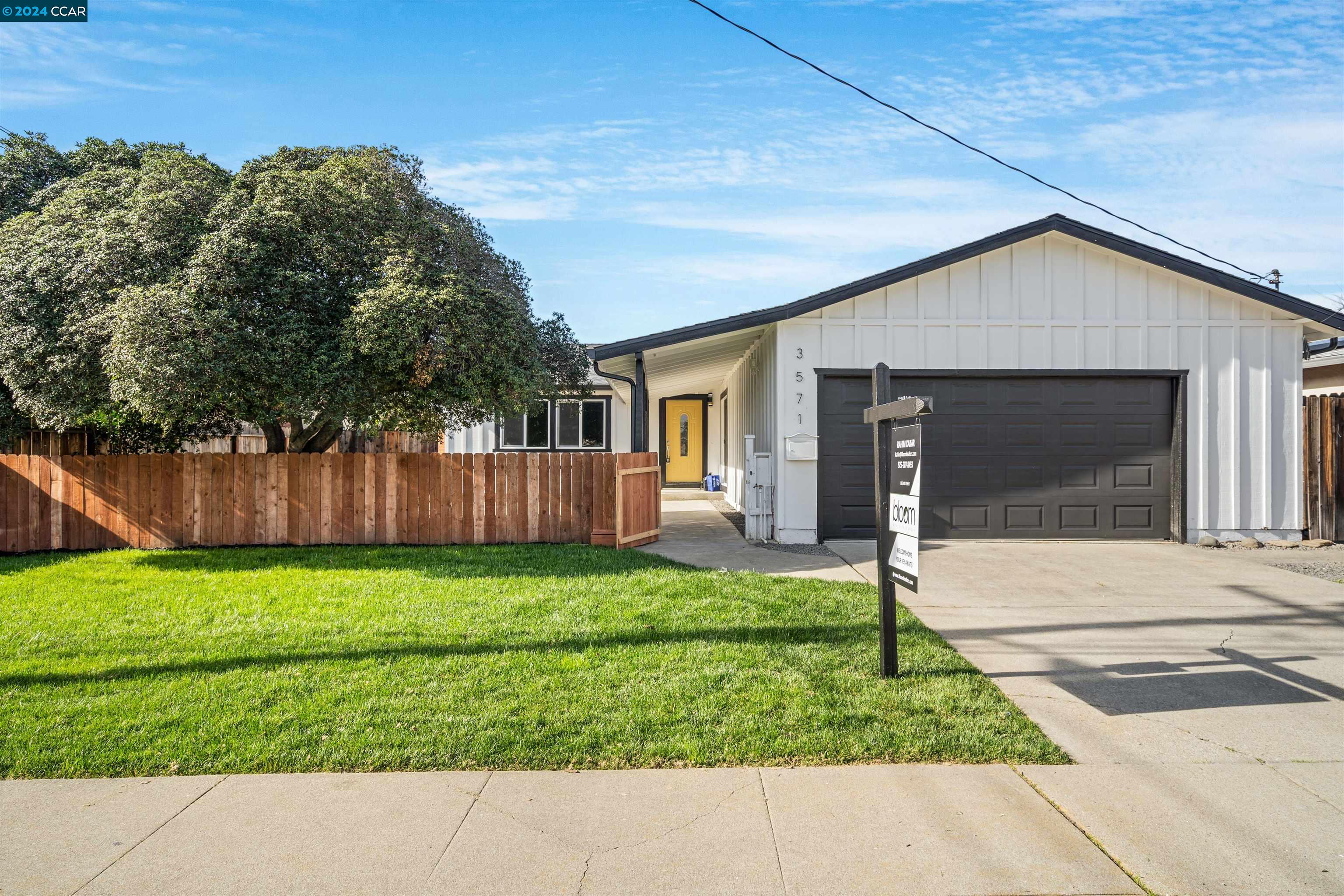 a house view with a garden space