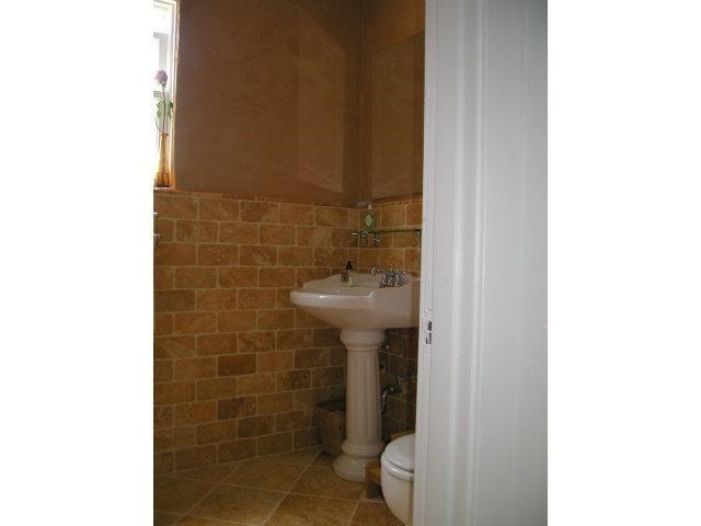 149 Warren Road San Mateo, CA 94401 - Photo 10 of 10 a bathroom with a sink a toilet and mirror