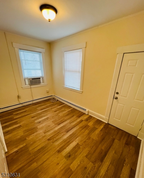 31 Elm Street, Unit 31C Westfield, NJ 07090 - Photo 8 of 8 a view of an empty room with wooden floor