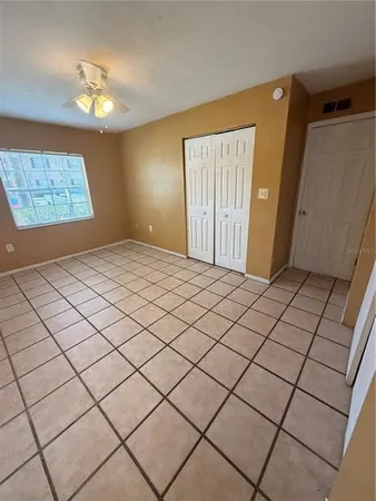 a view of a livingroom and window