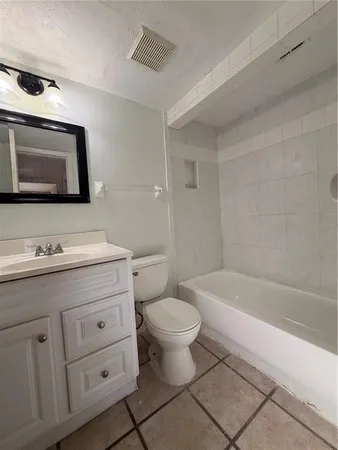 a bathroom with a mirror