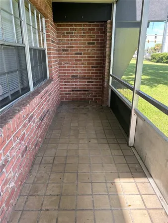 a view of a hallway with washer and dryer