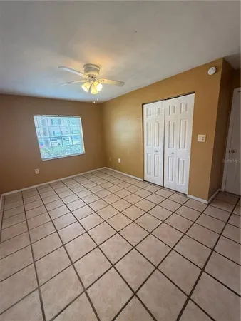 a view of an empty room and window