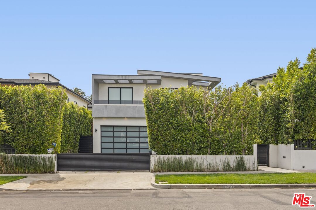 839 North Spaulding Avenue Los Angeles, CA 90046 - Photo 1 of 46 a view of a house with a yard