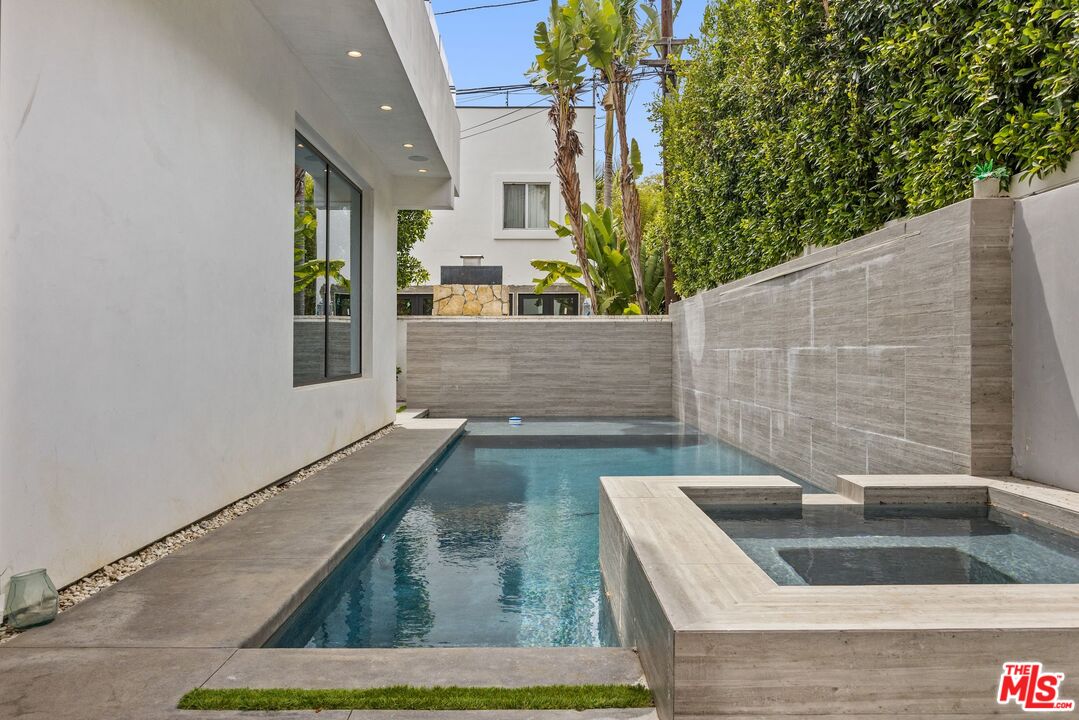 839 North Spaulding Avenue Los Angeles, CA 90046 - Photo 16 of 46 a view of swimming pool from a outdoor space