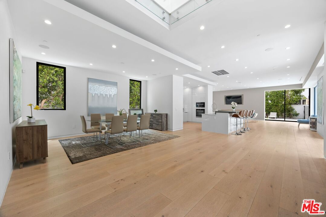839 North Spaulding Avenue Los Angeles, CA 90046 - Photo 3 of 46 a large white kitchen with a large window