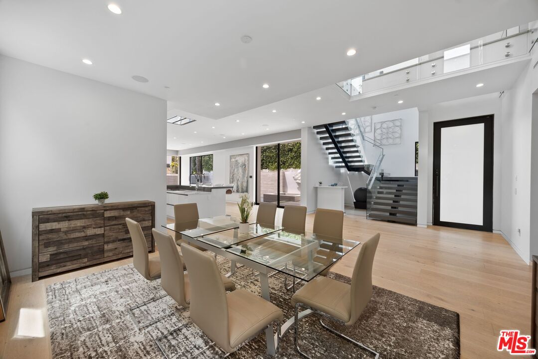 839 North Spaulding Avenue Los Angeles, CA 90046 - Photo 5 of 46 a living room with furniture and wooden floor