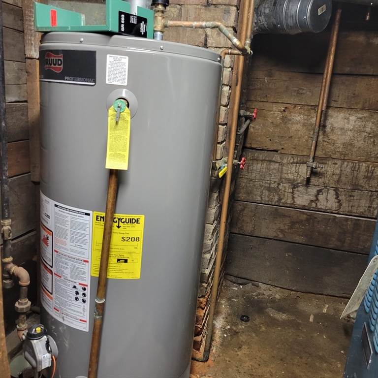 467 East 3rd Street Boston, MA 02127 - Photo 11 of 18 a bathroom with a sink and mirror
