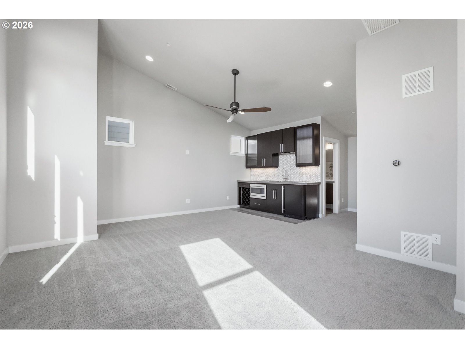 11375 Southwest Barber Street Wilsonville, OR 97070 - Photo 23 of 26 a living room with furniture and a fireplace