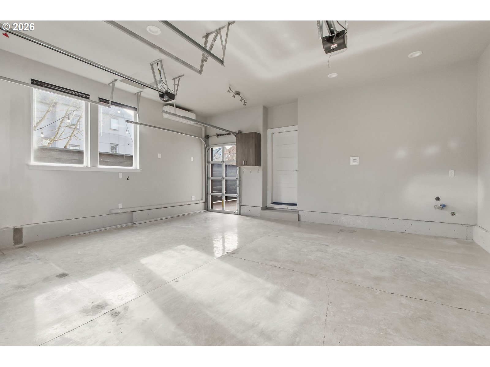 11375 Southwest Barber Street Wilsonville, OR 97070 - Photo 26 of 26 a view of a empty room with a ceiling fan