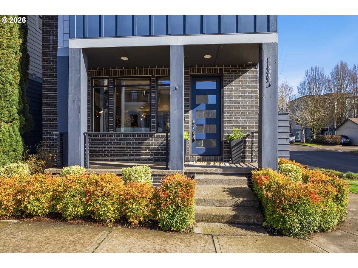 11375 Southwest Barber Street Wilsonville, OR 97070 - Photo 4 of 26 a view of a house with potted plants