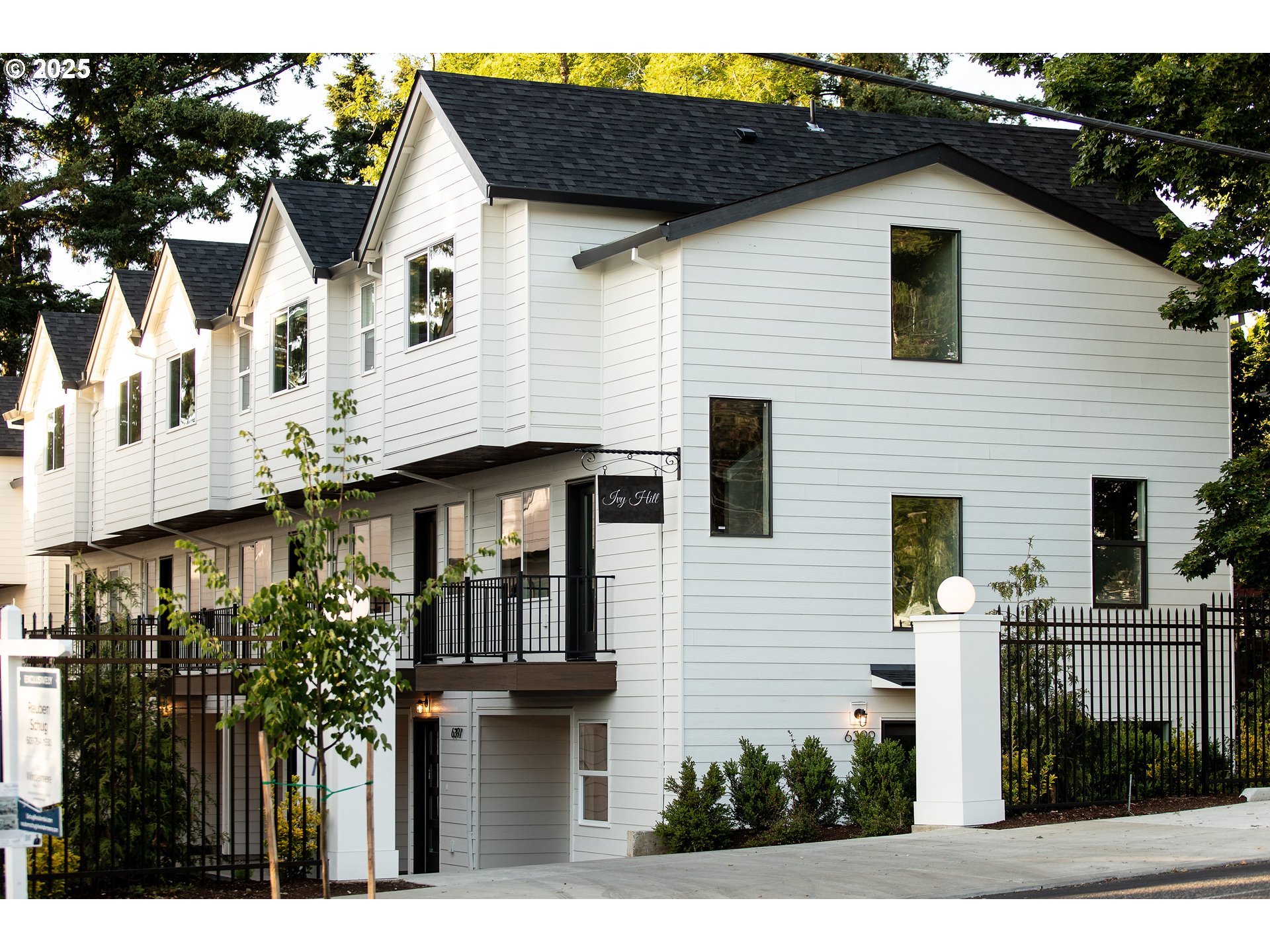 1669 Southeast Sherrett Street Portland, OR 97202 - Photo 2 of 14 a front view of a house with a garden
