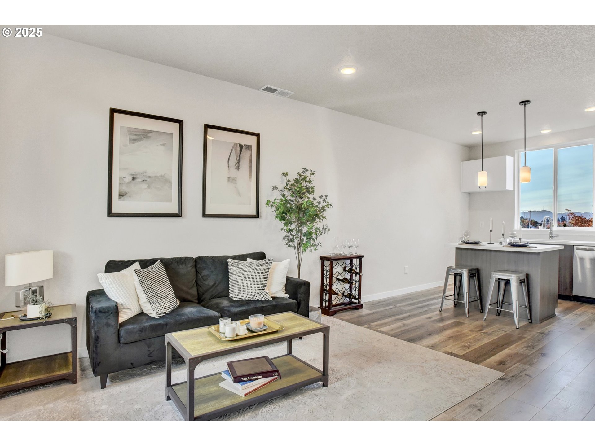 1669 Southeast Sherrett Street Portland, OR 97202 - Photo 4 of 14 a living room with furniture a dining table and a potted plant