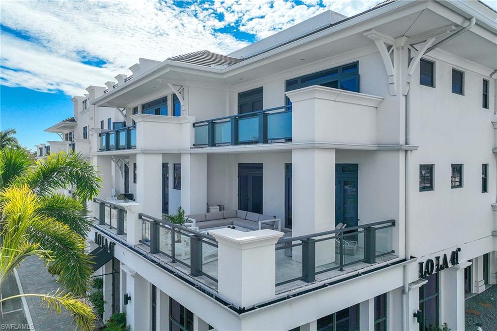 875 6th Avenue South, Unit 203 Naples, FL 34102 - Photo 20 of 49 One of only two residences in the building to offer such an expansive outdoor living space—creating an effortless indoor-outdoor lifestyle.