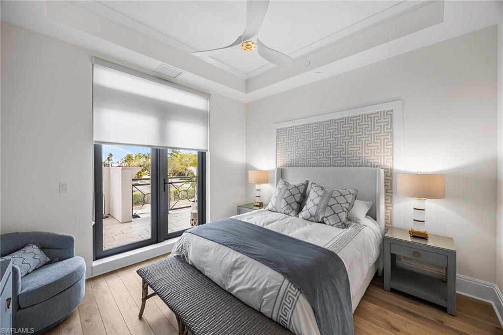 875 6th Avenue South, Unit 203 Naples, FL 34102 - Photo 28 of 49 Private guest bedroom suite with designer finishes and direct access to the lanai.