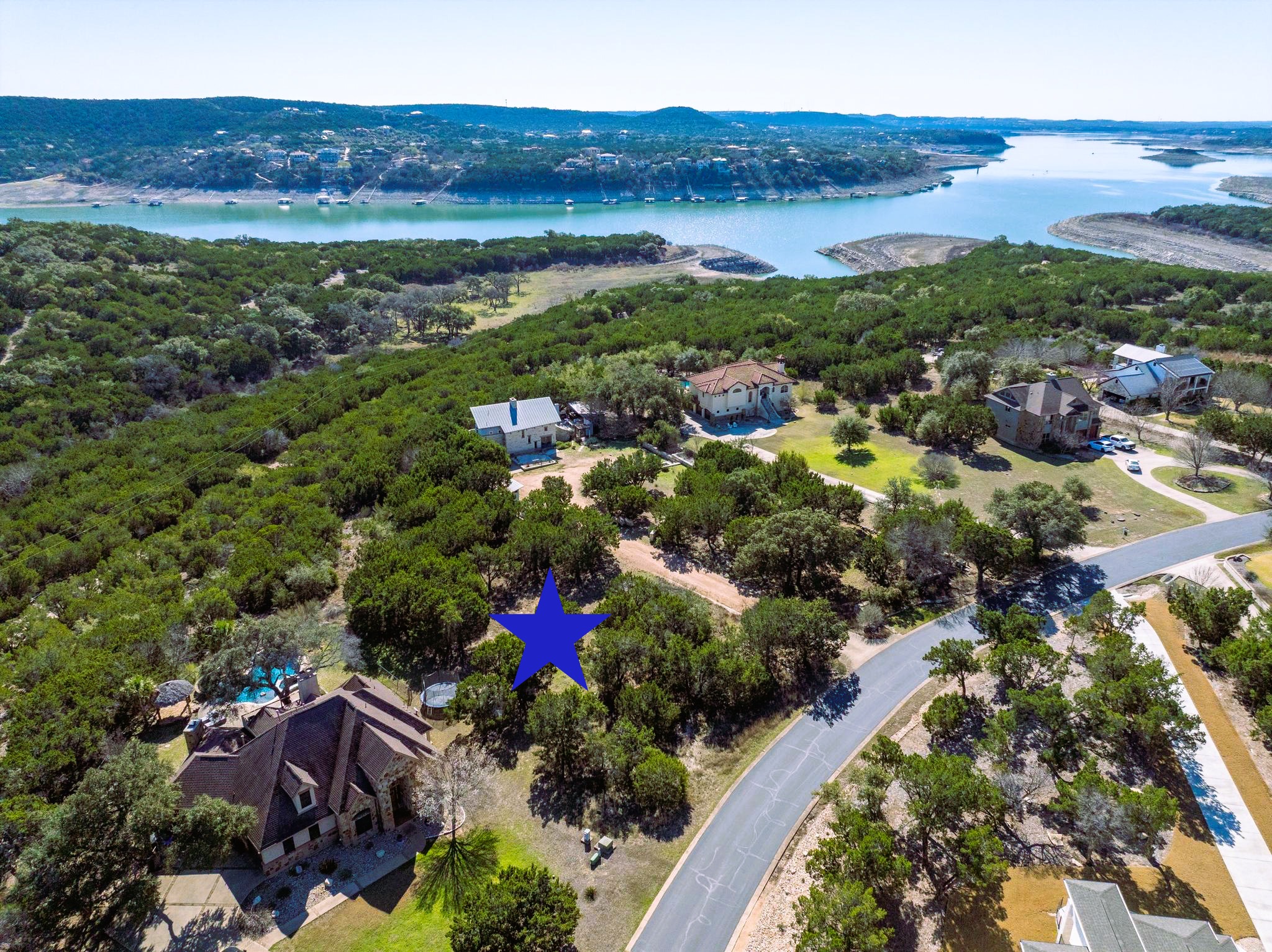 a view of a city with mountains in the background
