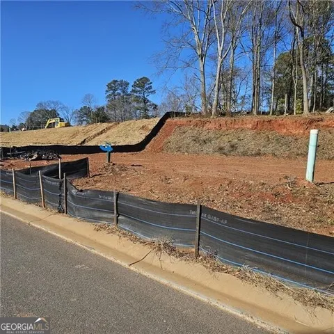 a view of a backyard with a patio