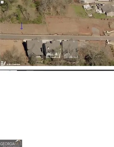 a black and white photo of a field