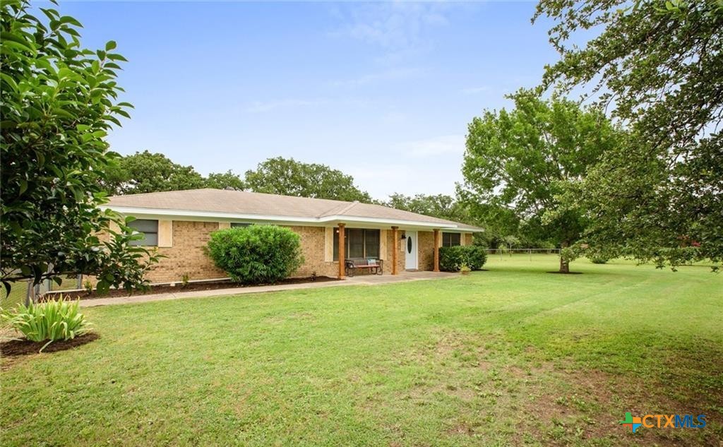 8510 Burgandy Lane Temple, TX 76504 - Photo 2 of 48 a front view of a house with a yard