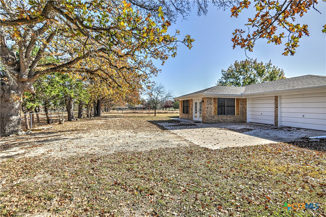8510 Burgandy Lane Temple, TX 76504 - Photo 32 of 48 a front view of a house with a yard and garage