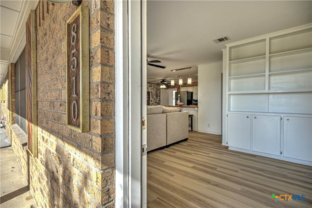 8510 Burgandy Lane Temple, TX 76504 - Photo 5 of 48 a view of a kitchen with a sink and cabinets