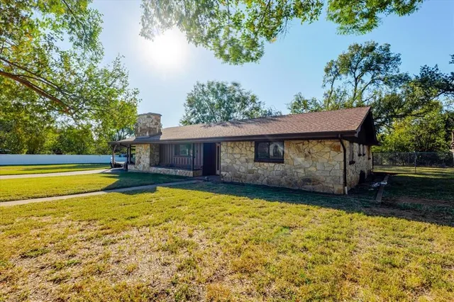 a view of a house with a swimming pool